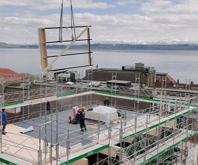 Surélévation d'un Immeuble à Neuchâtel | Ossature Bois Préfabriquée